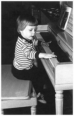 Lucy at the piano circa 1960